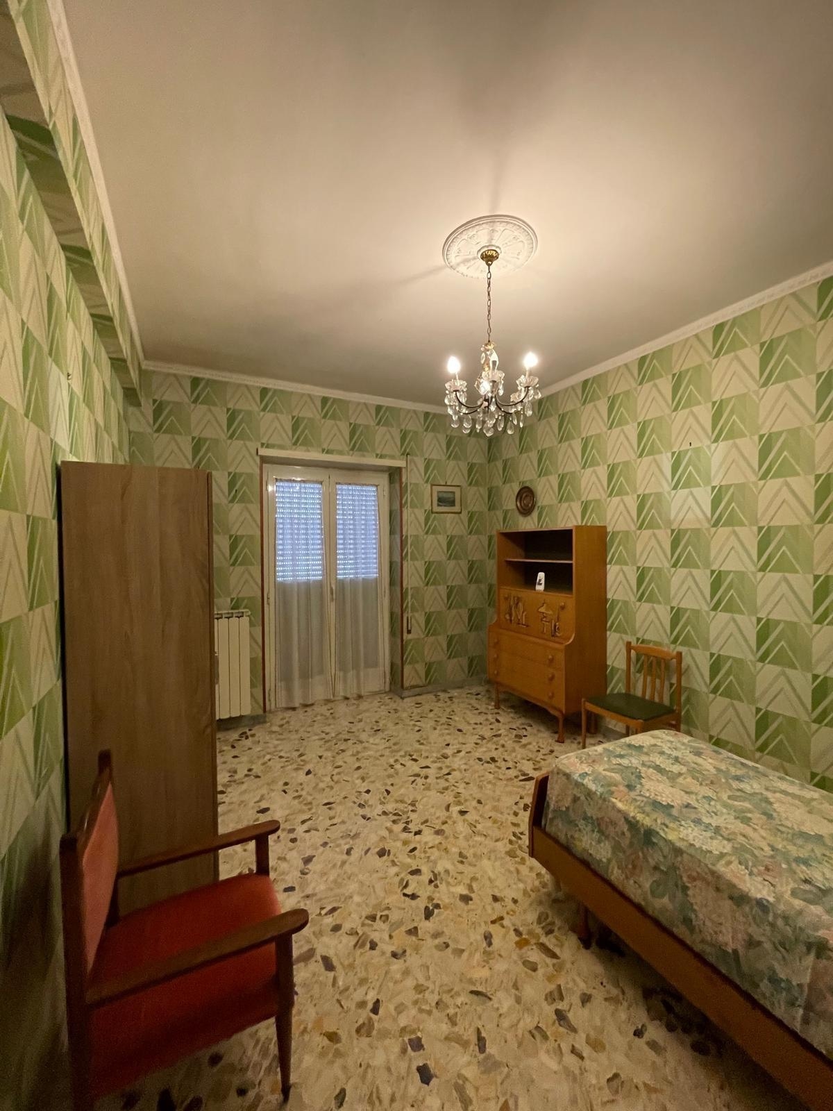 Accogliente stanza singola con balcone