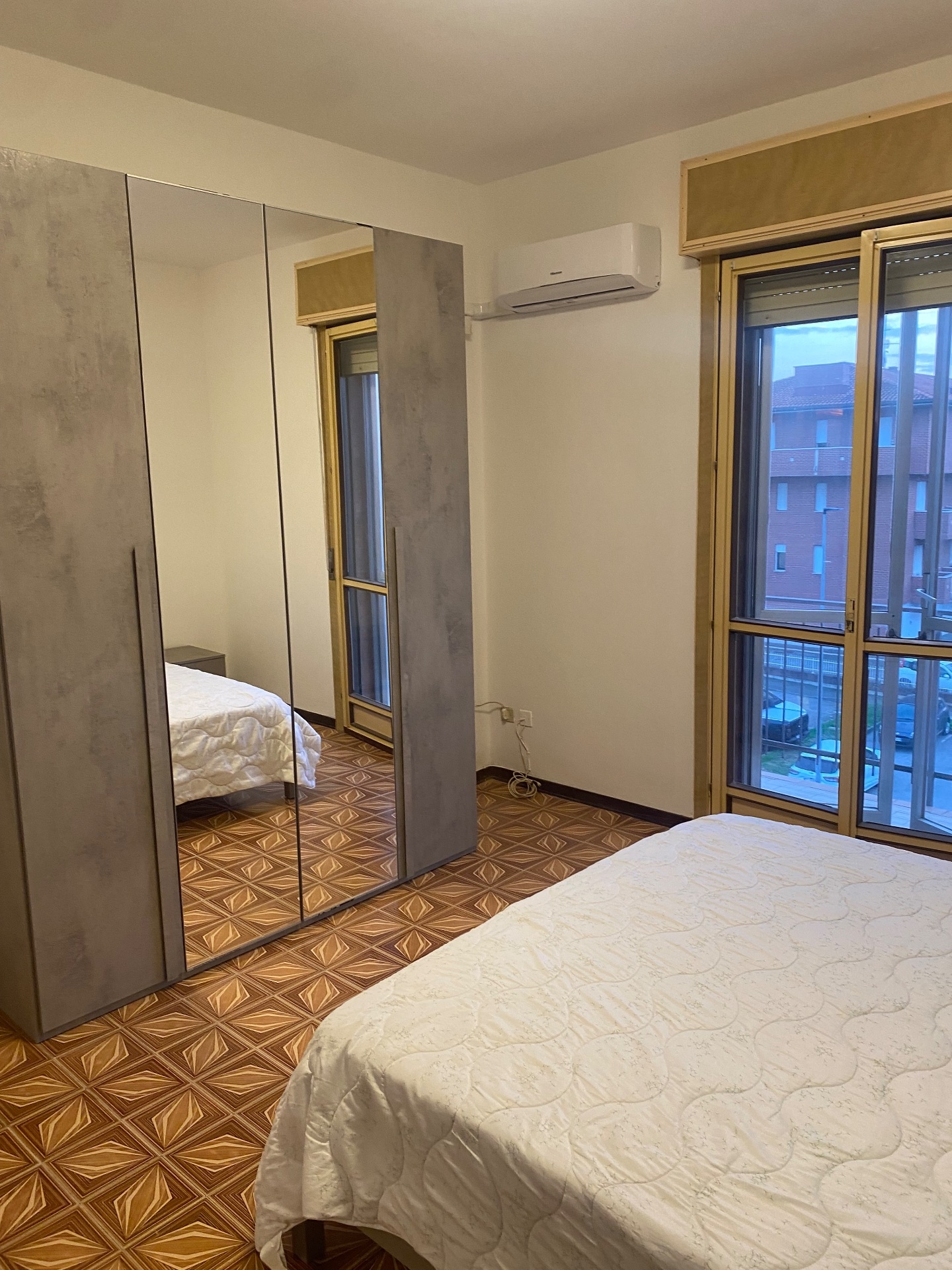 Stanza singola spaziosa con balcone