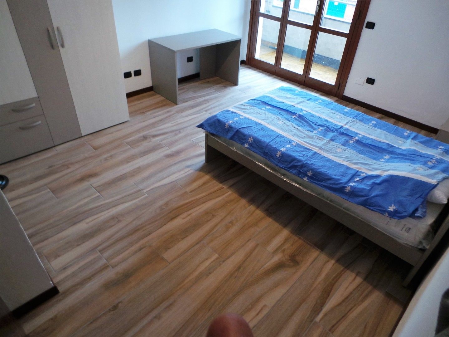 Stanza singola con bagno privato e balcone