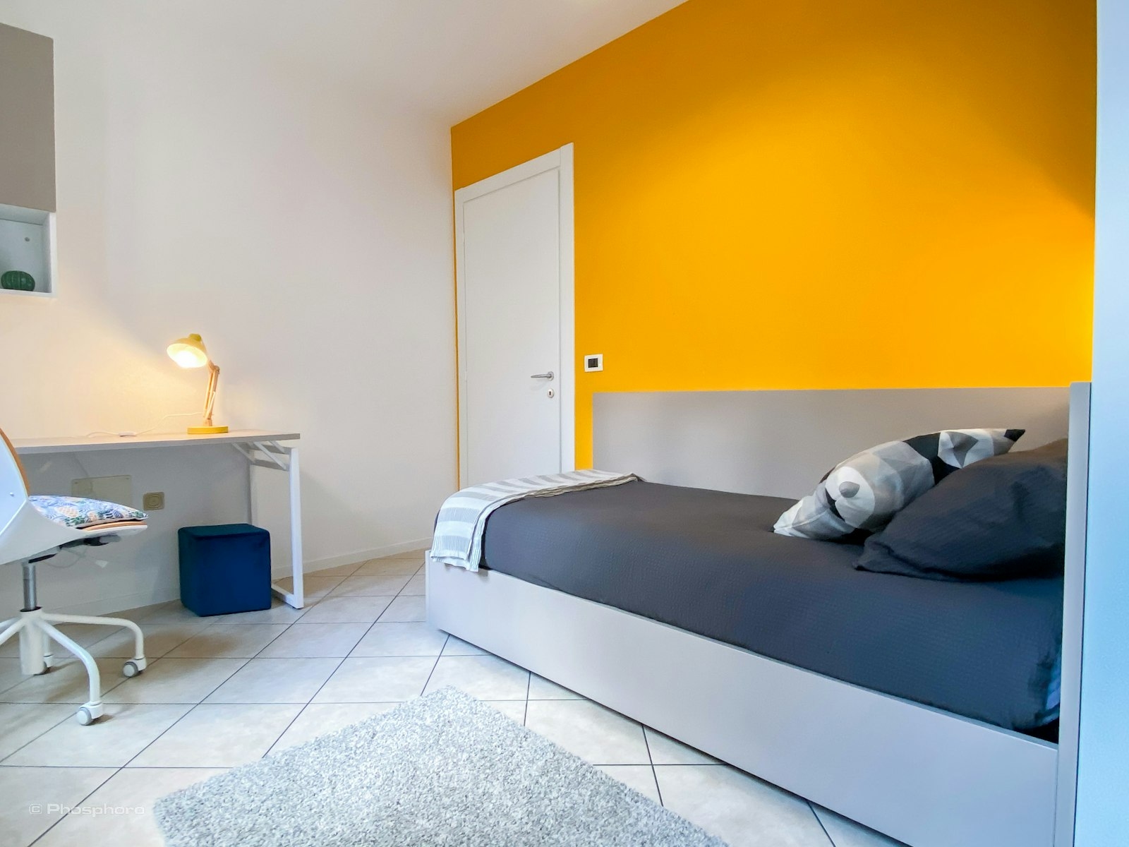 Singola Luminosa e Accogliente nella Residenza PHO.ROOM