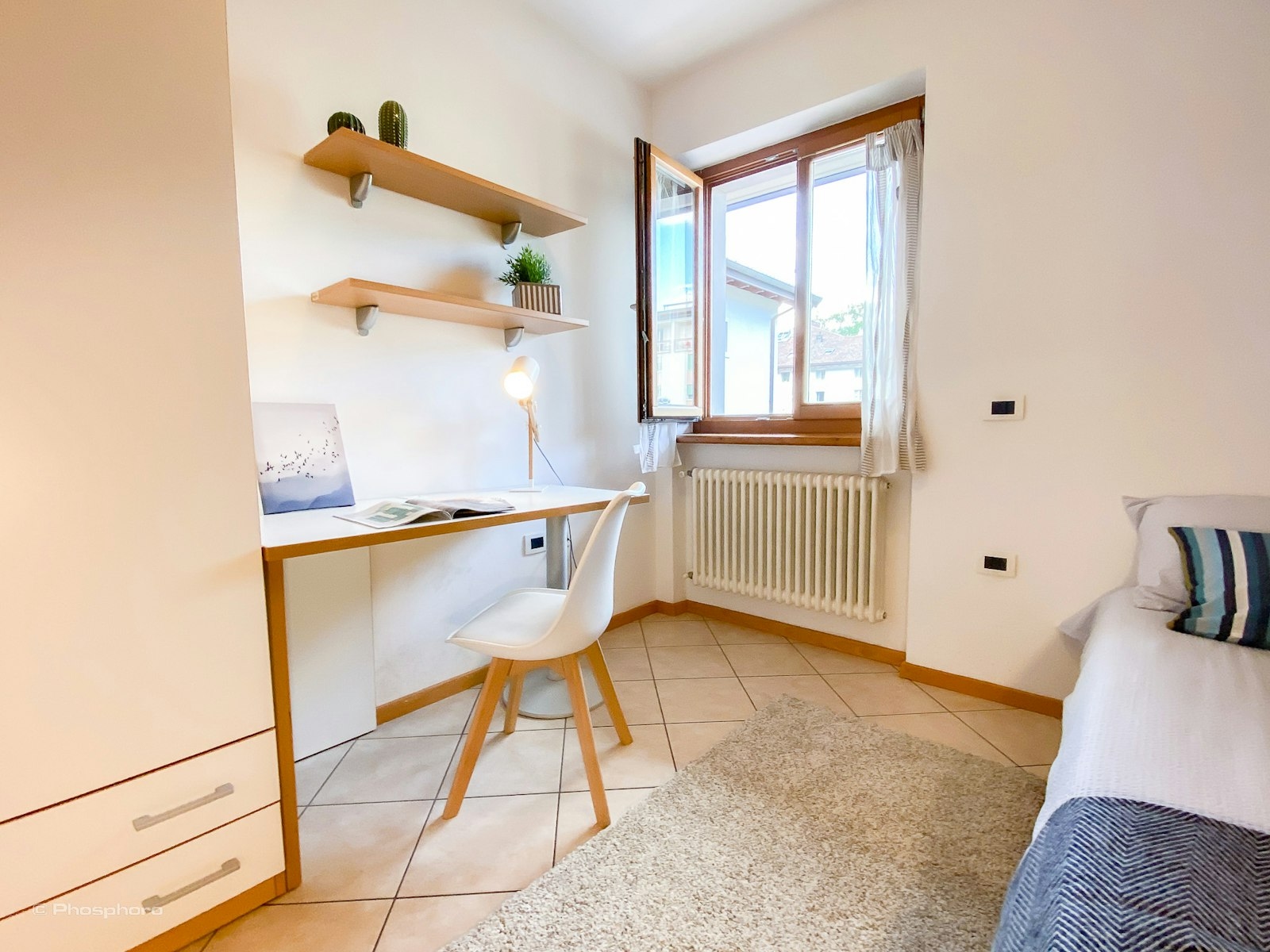 Una cameretta che non ha nulla da invidiare alle stanze più grandi della residenza PHO.ROOM