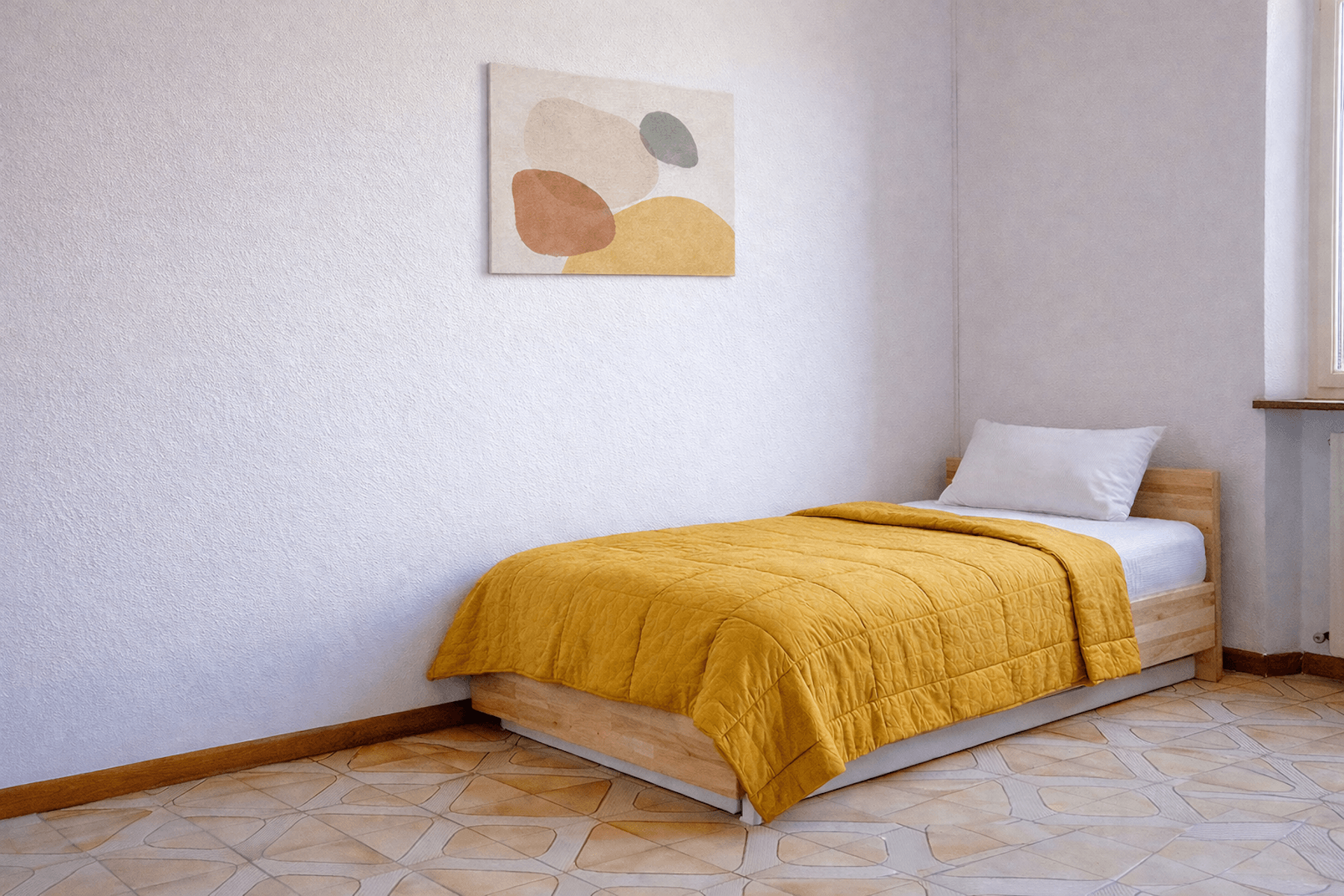 Stanza singola con divano a due passi dall'università