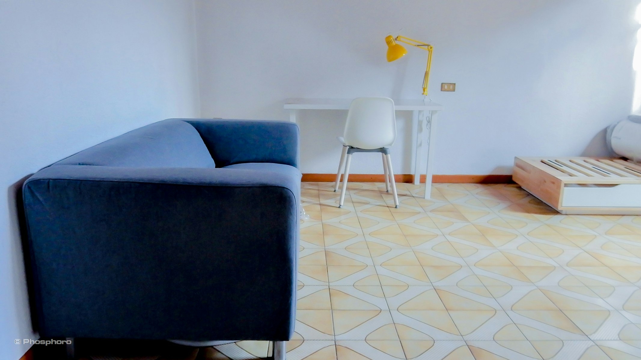 Stanza singola con divano a due passi dall'università