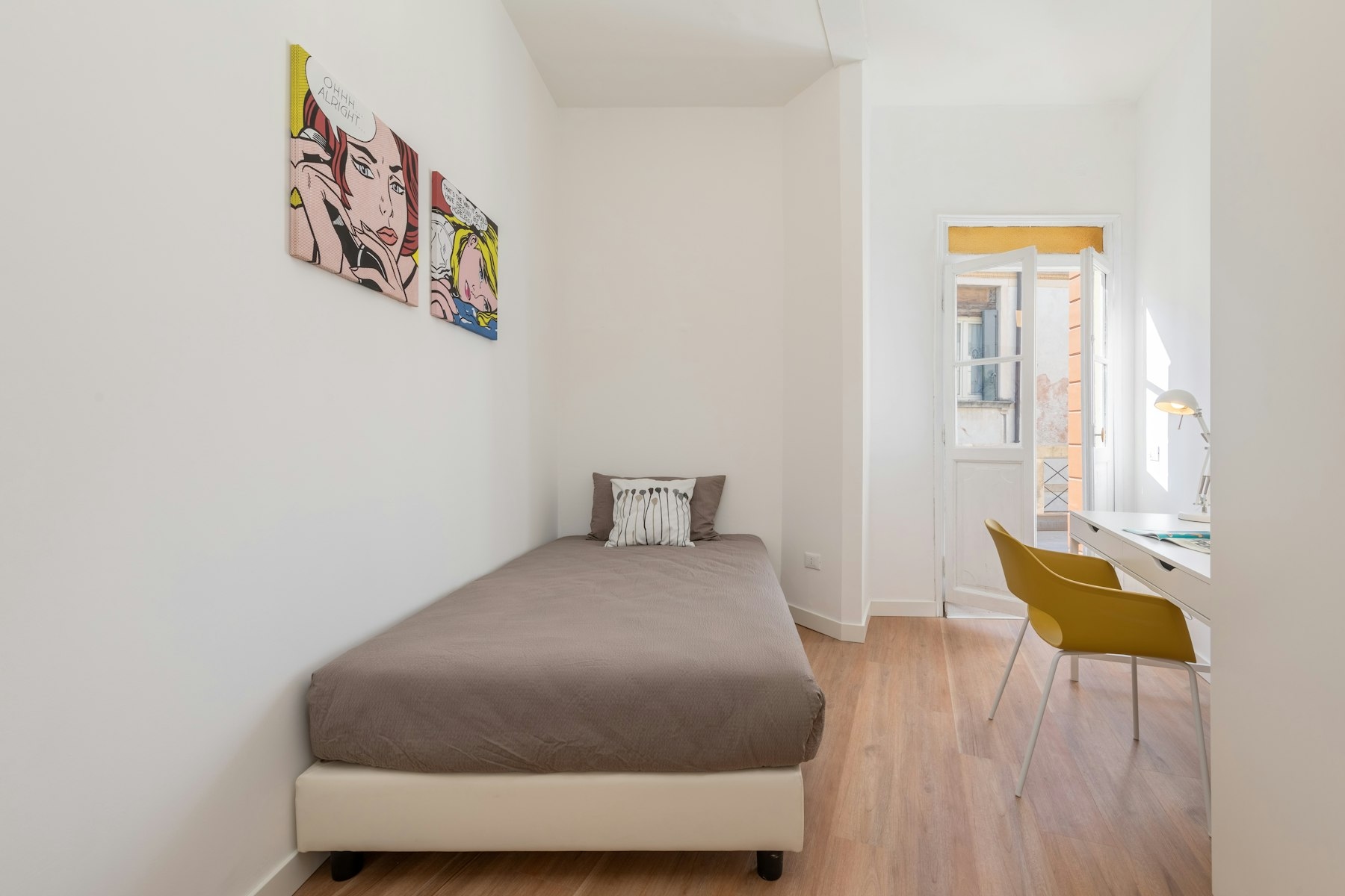 Singola con Balcone in Pieno Centro