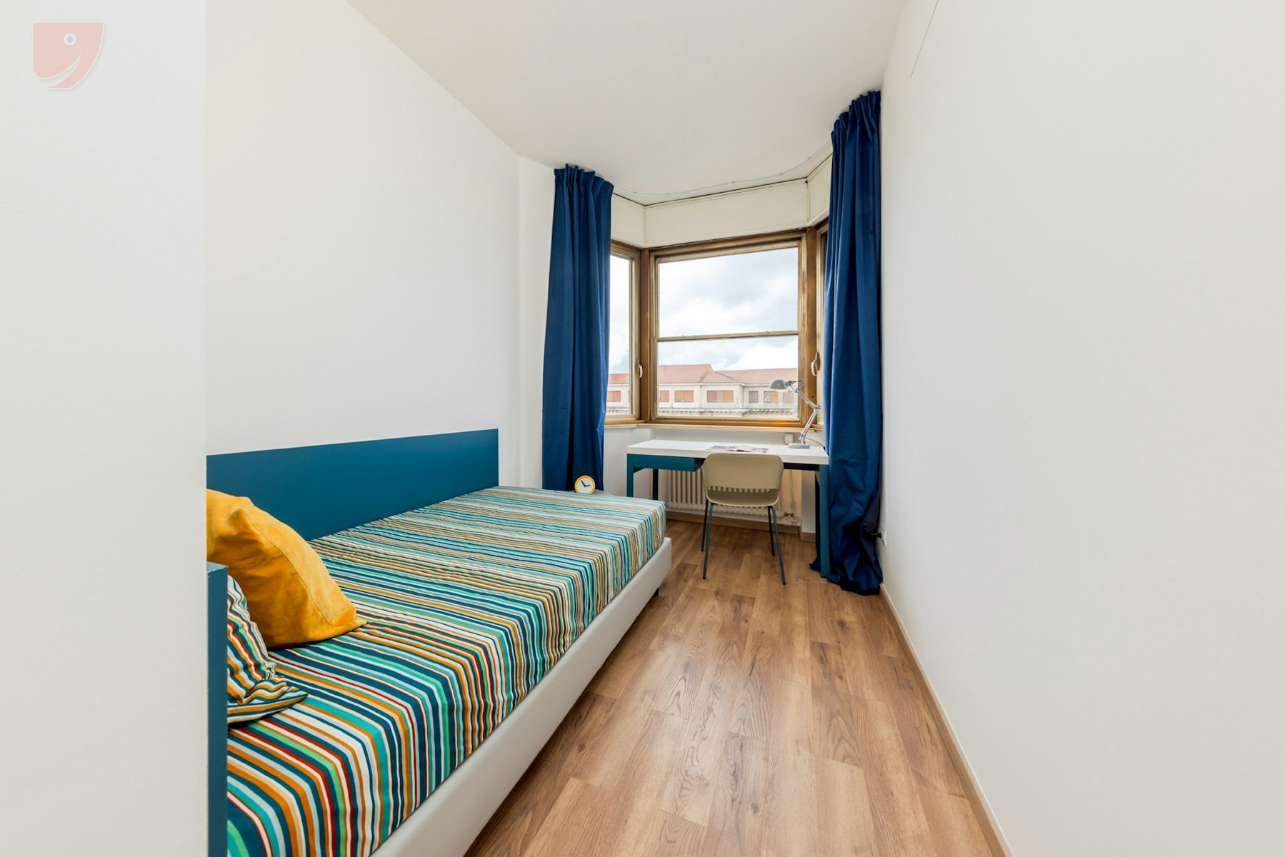 Singola Luminosa con Balcone