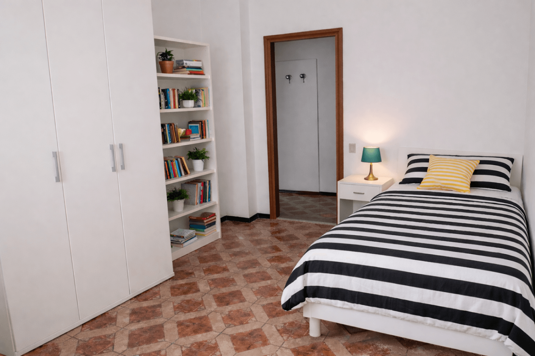 Comoda stanza singola dal design minimal