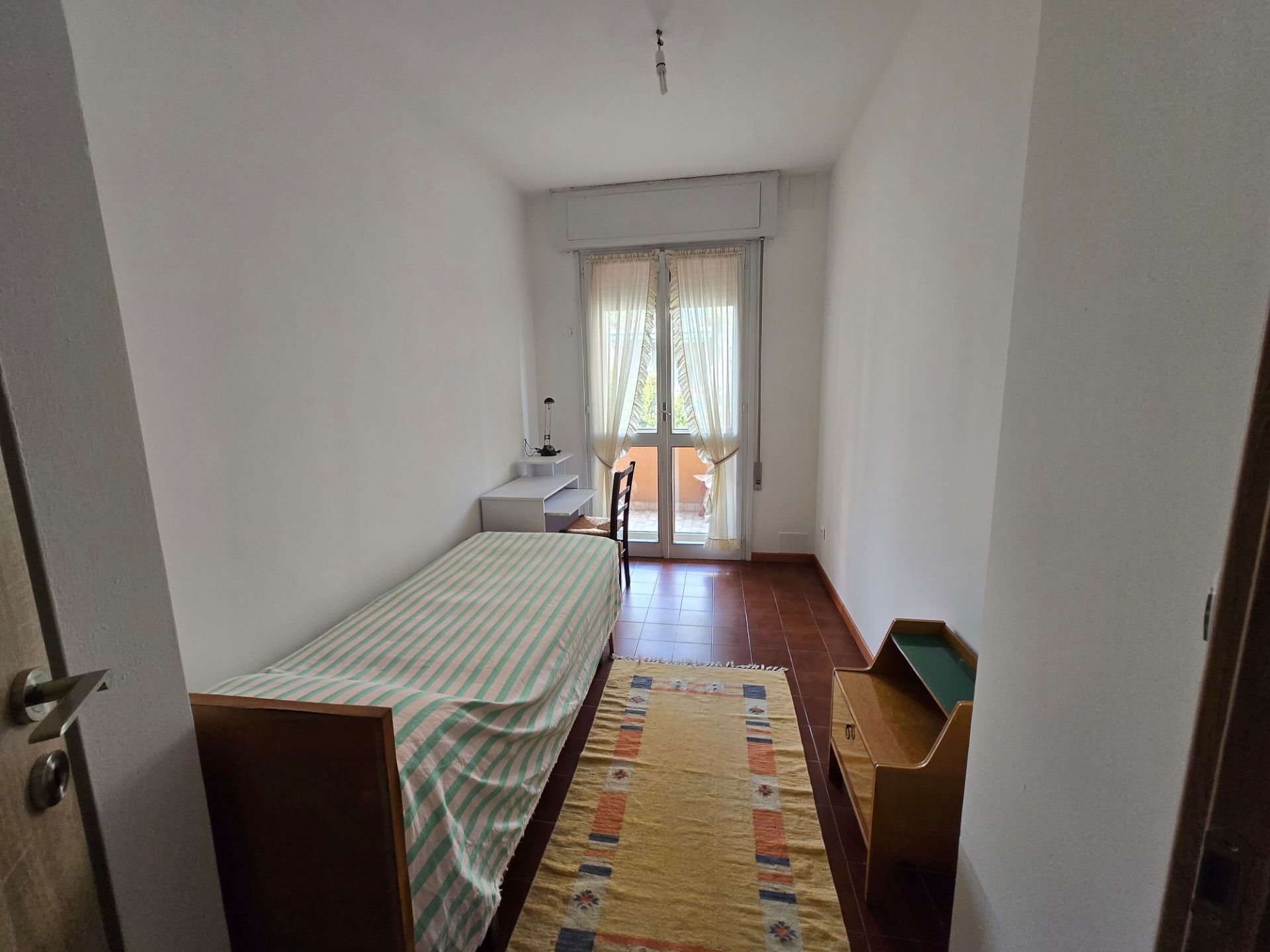 Stanza singola con accesso al balcone