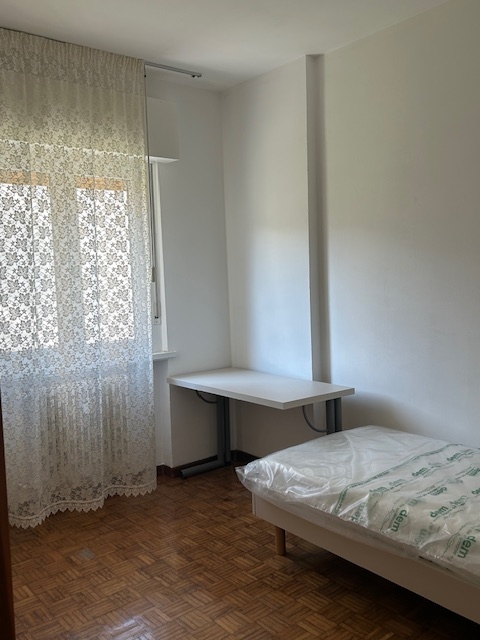 Camera singola luminosa e accogliente